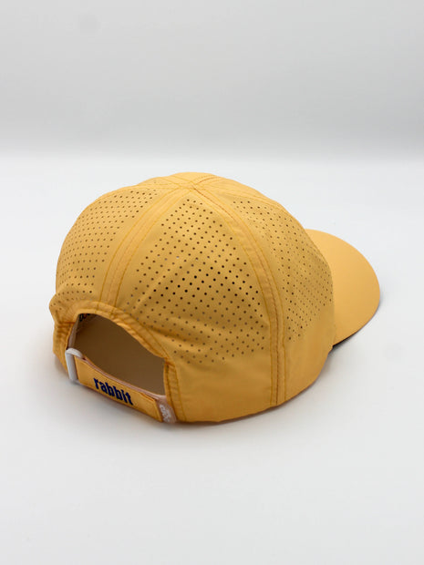 Elite Hat by Rabbit in yellow with laser-cut vents and lightweight-wicking fabric, cap-style sun protection for outdoor running and gear use