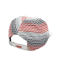 Elite Hat by Rabbit in red, black, and white with baseball cap bill, laser-cut vents, lightweight wicking for sun and gear protection