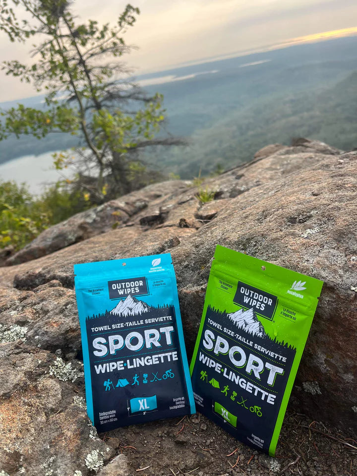 Sport Wipes by Outdoor Wipes in blue and green XL packs, body care wipes for camping, running, and outdoor use without showers