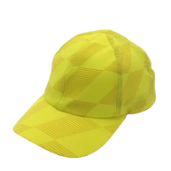 Low Light Tech Cap by Rabbit in bright yellow with reflective pattern, designed for visibility and safety in dark conditions.