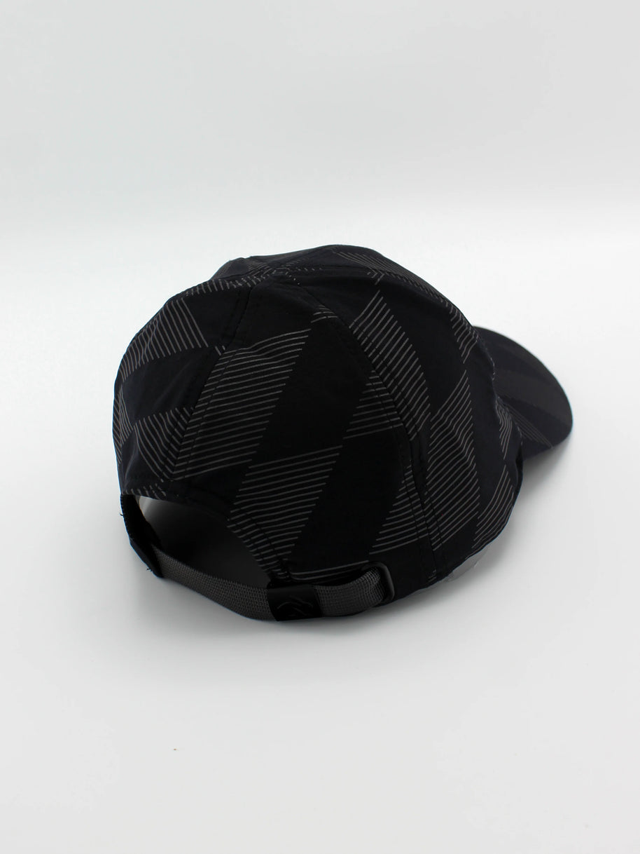 Low Light Tech Cap by Rabbit in black with reflective geometric pattern, adjustable fit, designed for visibility in low light running and outdoor use