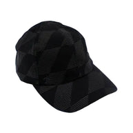 Low Light Tech Cap by Rabbit in black with subtle check pattern, designed for visibility and safety in low light conditions