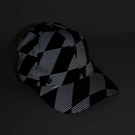 Low Light Tech Cap by Rabbit in black with reflective geometric pattern, designed for visibility and safety in low light conditions