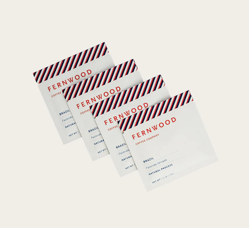 Instant Coffee by Fernwood in white packets with red and blue accents, Brazil origin, small-batch brewed pure crystallized coffee solids, canada-made.