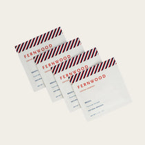 Instant Coffee by Fernwood in white packets with red and blue accents, Brazil origin, small-batch brewed pure crystallized coffee solids, canada-made.