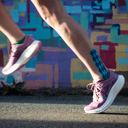 Ride 17 - Women by Saucony in purple and white with PWRRUN+ cushioning, lightweight road running shoes for daily comfort and performance