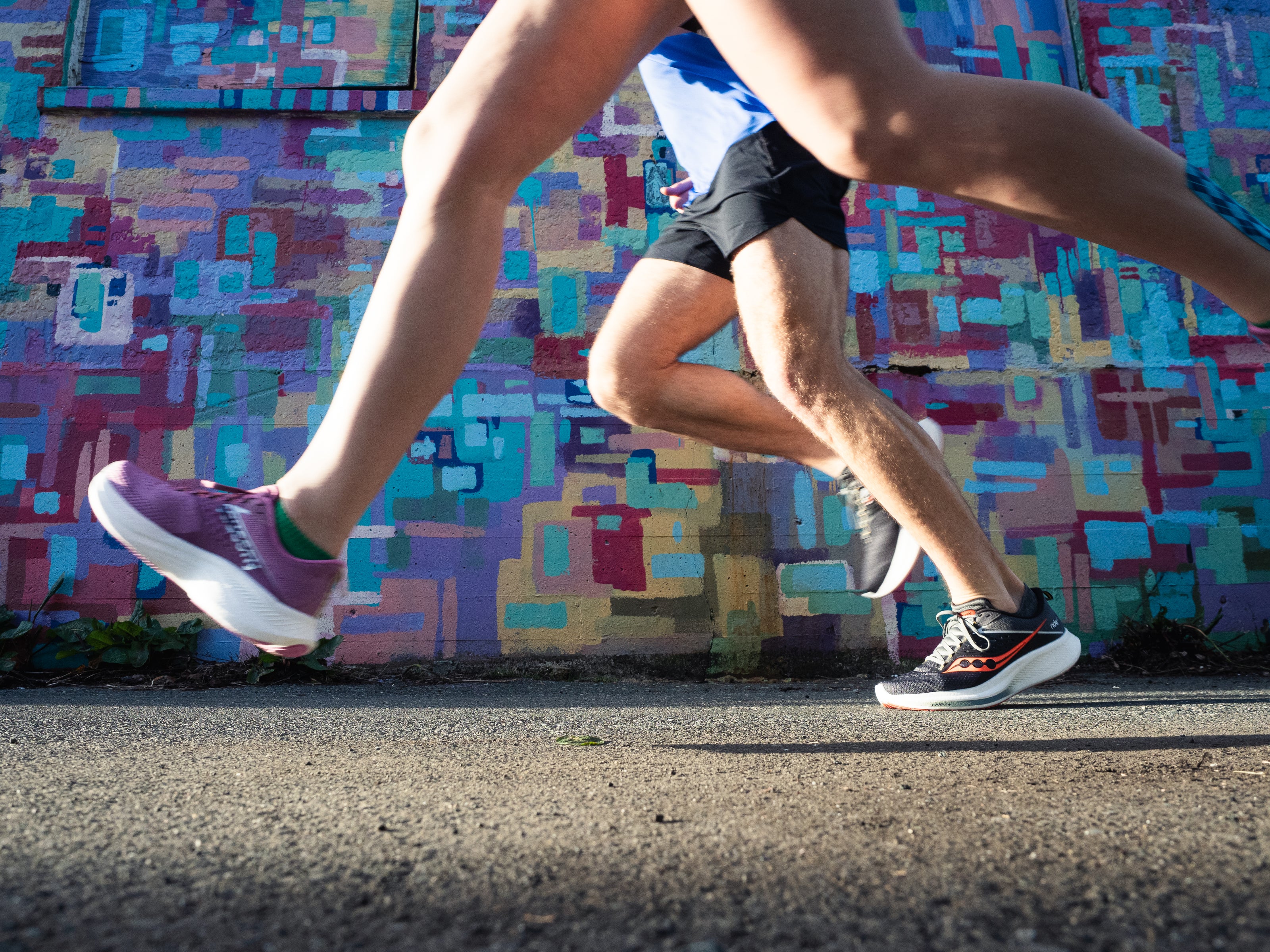Ride 17 - Women by Saucony in purple and white, cushioned running shoes with PWRRUN+ foam for comfort on road runs and daily wear