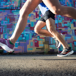 Ride 17 - Women by Saucony in purple and white, cushioned running shoes with PWRRUN+ foam for comfort on road runs and daily wear