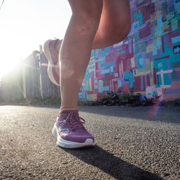 Ride 17 - Women by Saucony in purple and white with PWRRUN+ cushioning designed for comfortable road running and daily wear