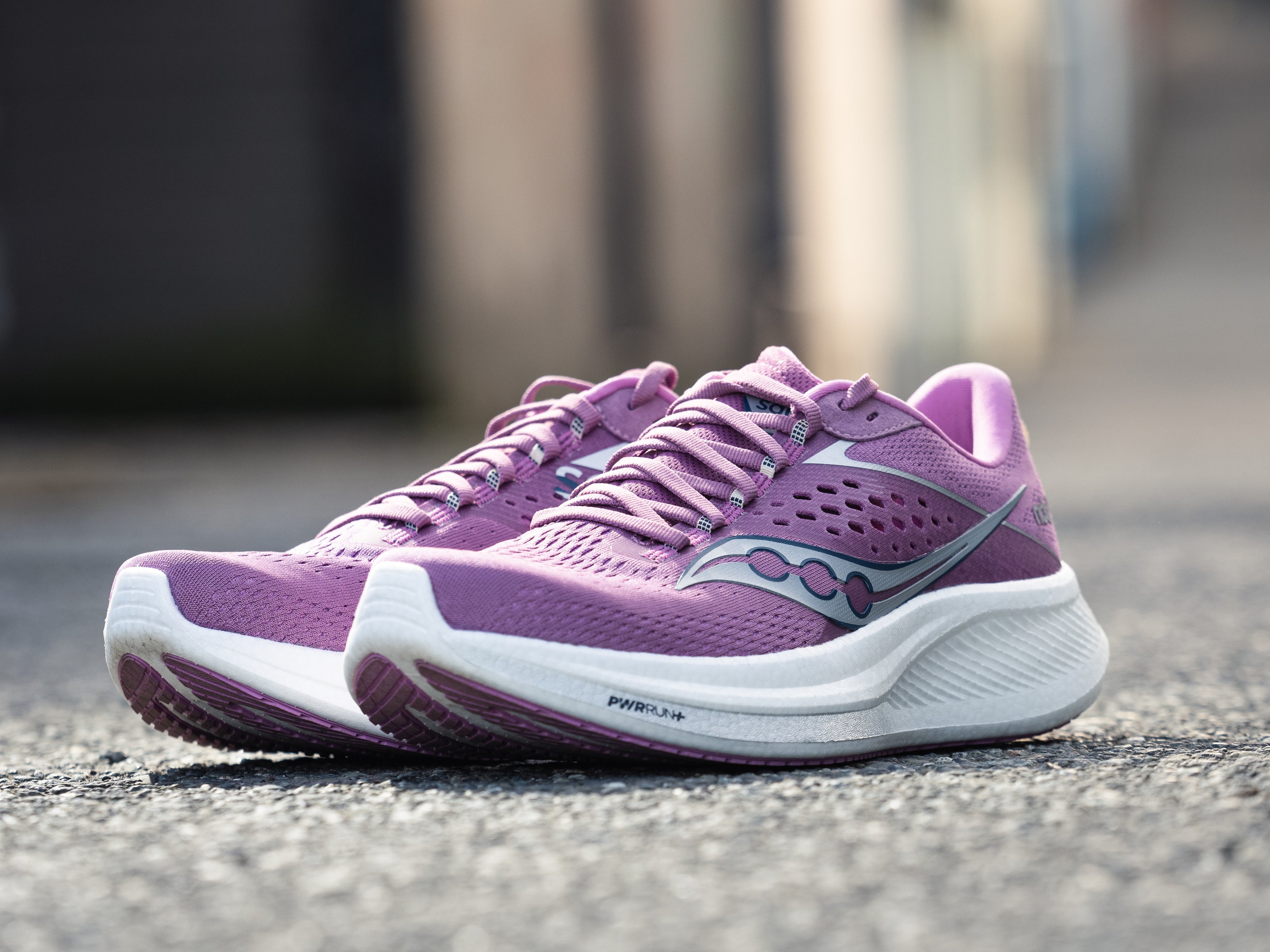 Ride 17 - Women by Saucony in purple with advanced PWRRUN+ foam cushioning, lightweight road running shoes for comfort and performance
