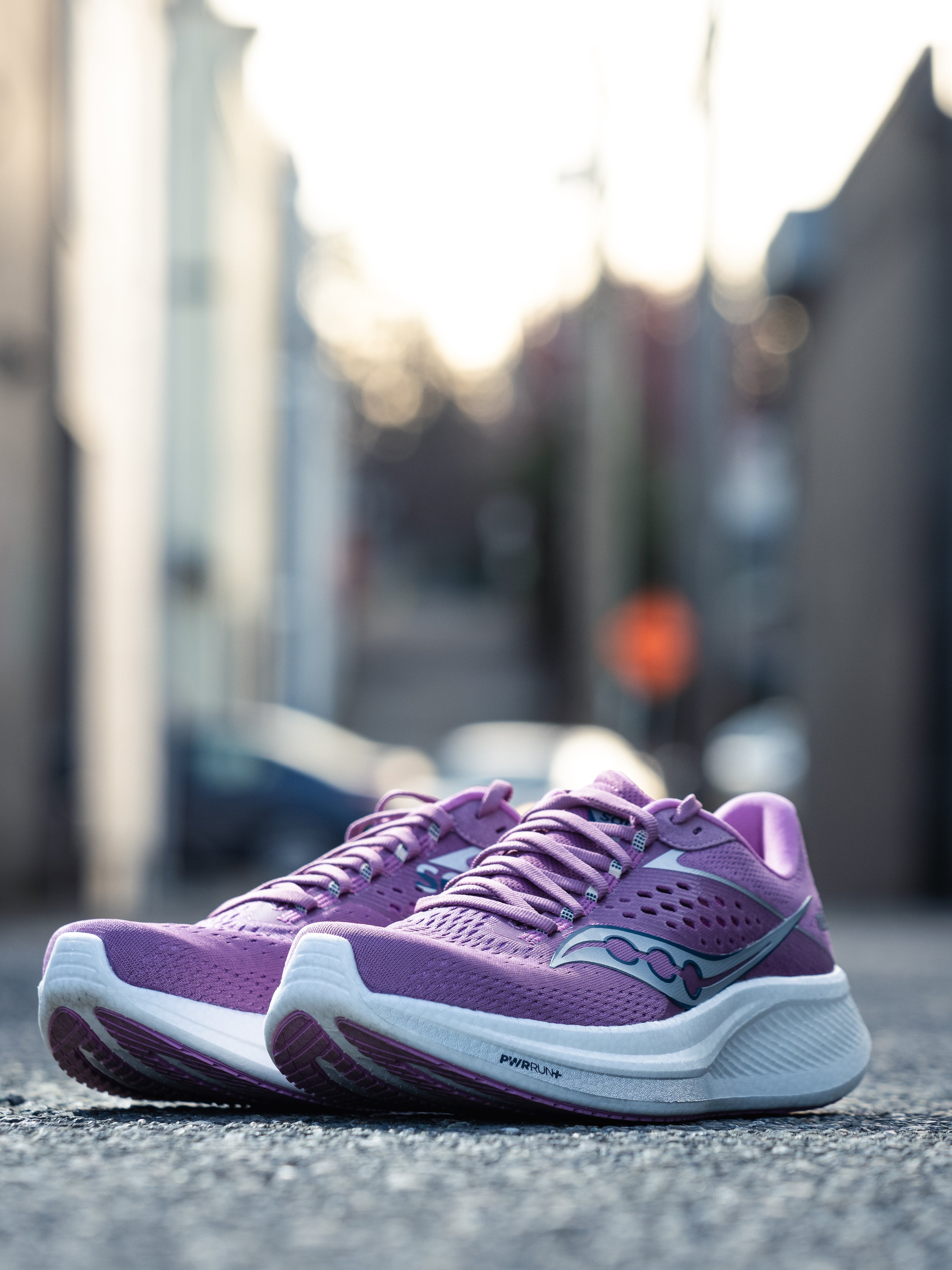 Ride 17 - Women by Saucony in purple and white, cushioned running shoes with PWRRUN+ foam for comfort on road and daily runs