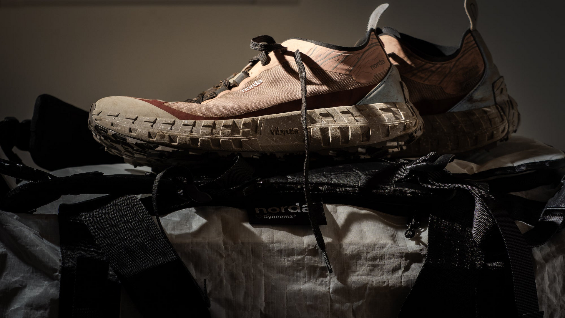Norda 002 Core trail running shoes in brown and black with durable Vibram sole designed for rugged outdoor use and hiking