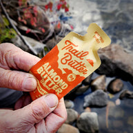Almond Butter - Dark Chocolate & Coffee by Trail Butter in orange pouch, rich caffeinated nut butter blend for energy and nutrition outdoors