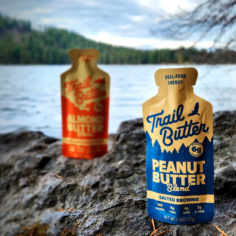Peanut Butter - Salted Brownie by Trail Butter in blue and tan pouch, protein-packed with dark chocolate, vanilla, roasted peanuts for real-food energy