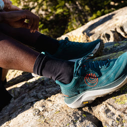 Ultraventure 4 - Men by Topo Athletic in teal and orange, plush platform trail running shoe ideal for comfort and outdoor trails