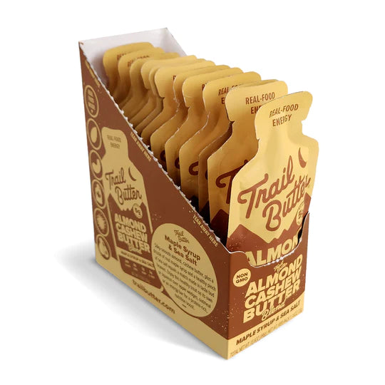 Almond Cashew Butter - Maple Syrup & Sea Salt by Trail Butter in brown and tan pack, silky-smooth nut butter with real maple syrup and sea salt for energy and healthy snacking