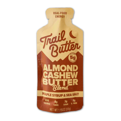 Almond Cashew Butter - Maple Syrup & Sea Salt by Trail Butter in beige and brown pouch with real-food energy blend for healthy snacking
