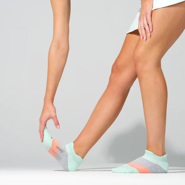 Elite Ultra Light Cushion No Show Tab - 2023 by Feetures in mint and coral, anatomical socks with targeted compression for running and active use