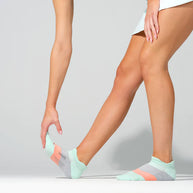 Elite Ultra Light Cushion No Show Tab - 2023 by Feetures in mint and coral, anatomical socks with targeted compression for running and active use