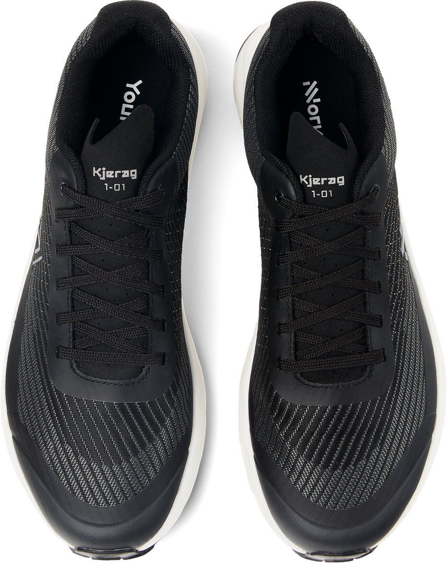 Kjerag - Unisex by NNormal in black and white, max-performance trail running shoe designed for fast, lightweight outdoor running and hiking