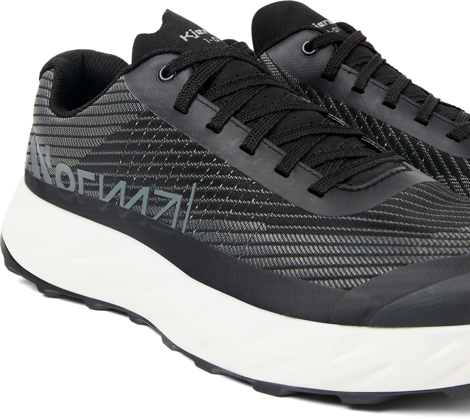 Kjerag - Unisex by NNormal in black and grey, max-performance trail running shoe designed for fast, lightweight outdoor running and hiking