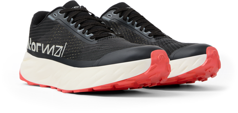 Pair of NNormal Kjerag 2 trail running shoes in Black, front three-quarter view with coral outsoles
