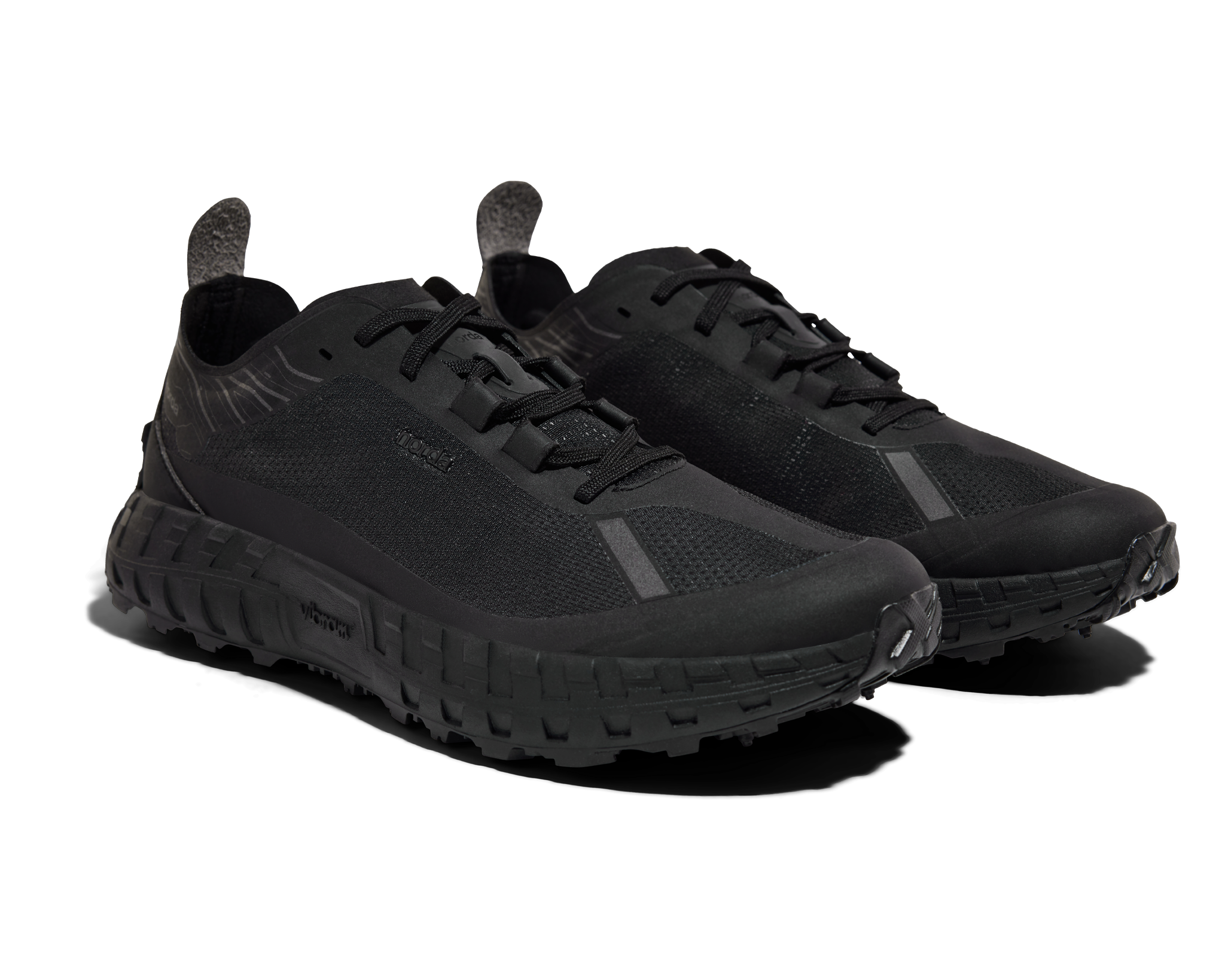 001 Core - Women by Norda in all black with seamless Bio-Dyneema upper and Vibram sole, lightweight trail running shoe for outdoor use