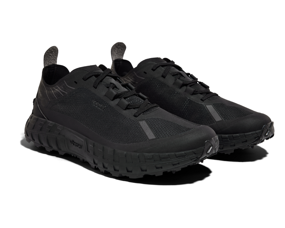 001 Core - Women by Norda in all black with seamless Bio-Dyneema upper and Vibram sole, lightweight trail running shoe for outdoor use