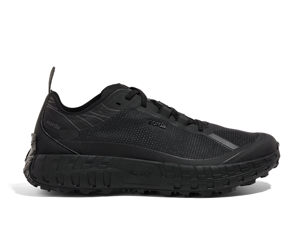 001 Core - Women by Norda in black lightweight trail shoe with seamless Bio-Dyneema upper and Vibram sole for running and outdoor use