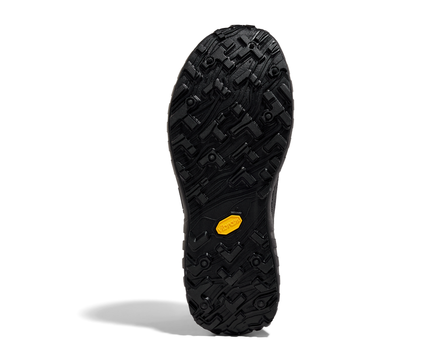 001 Core - Women by Norda in black showing Vibram soleplate designed for lightweight, strong trail running and outdoor use