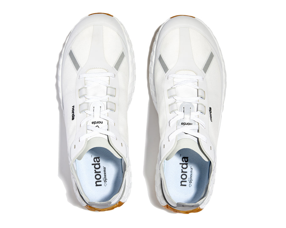 001 Core - Women by Norda in white with Bio-Dyneema upper and Vibram sole, lightweight trail shoe for durable outdoor running and hiking