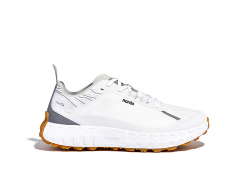 001 Core - Women by Norda in white and grey with Bio-Dyneema upper and Vibram sole designed for lightweight trail running and outdoor use