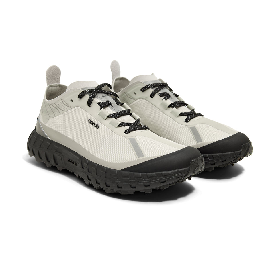 001A - Cinder - Women by Norda in light grey and black with Arnitel TPEE midsole for lightweight trail running and outdoor comfort