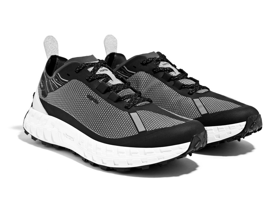 001 Core - Women by Norda in black and white with Bio-Dyneema upper and Vibram sole, lightweight trail running shoe for outdoor use