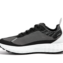 001 Core - Women by Norda in black and white with seamless Bio-Dyneema upper and Vibram sole for lightweight trail running and outdoor use