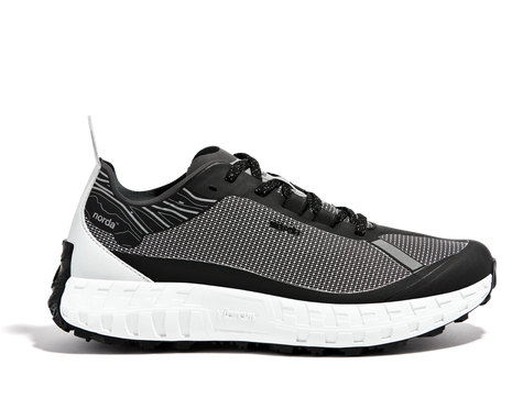 001 Core - Women by Norda in black and white with Bio-Dyneema upper and Vibram sole for lightweight durable trail running shoes