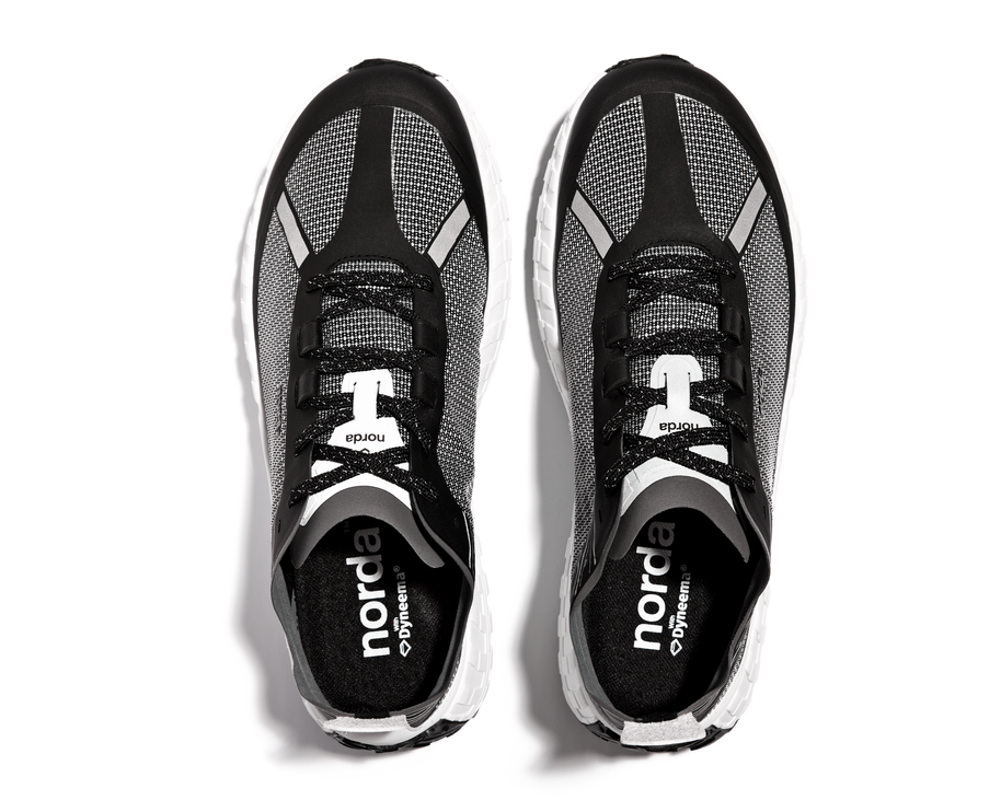 001 Core - Women by Norda in black and grey with Bio-Dyneema upper and Vibram sole designed for lightweight trail running