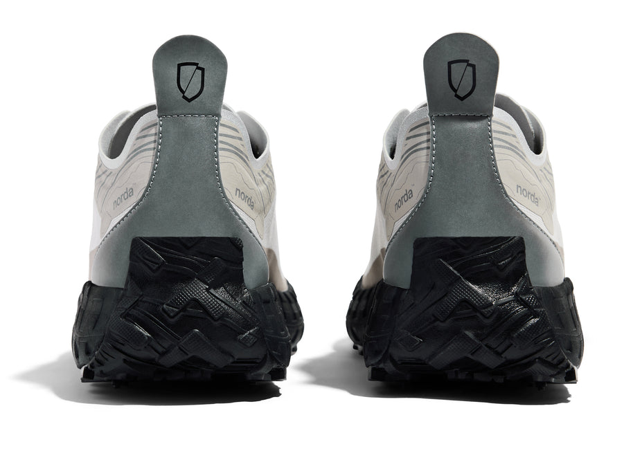 001 Core - Women by Norda in beige and black with seamless Bio-Dyneema upper and Vibram sole for lightweight trail running in Canada