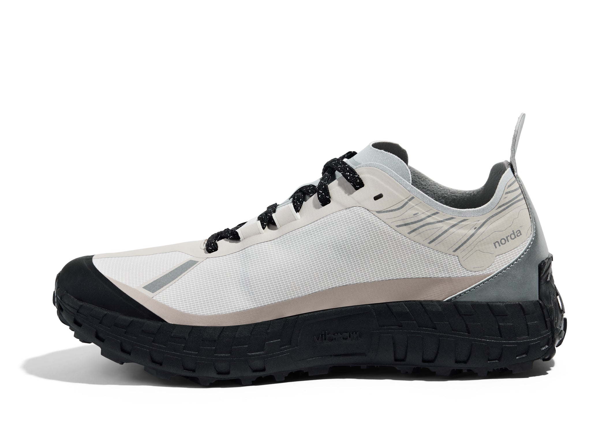 001 Core - Women by Norda in white and grey with seamless Bio-Dyneema upper and Vibram sole, lightweight trail running shoe from Canada