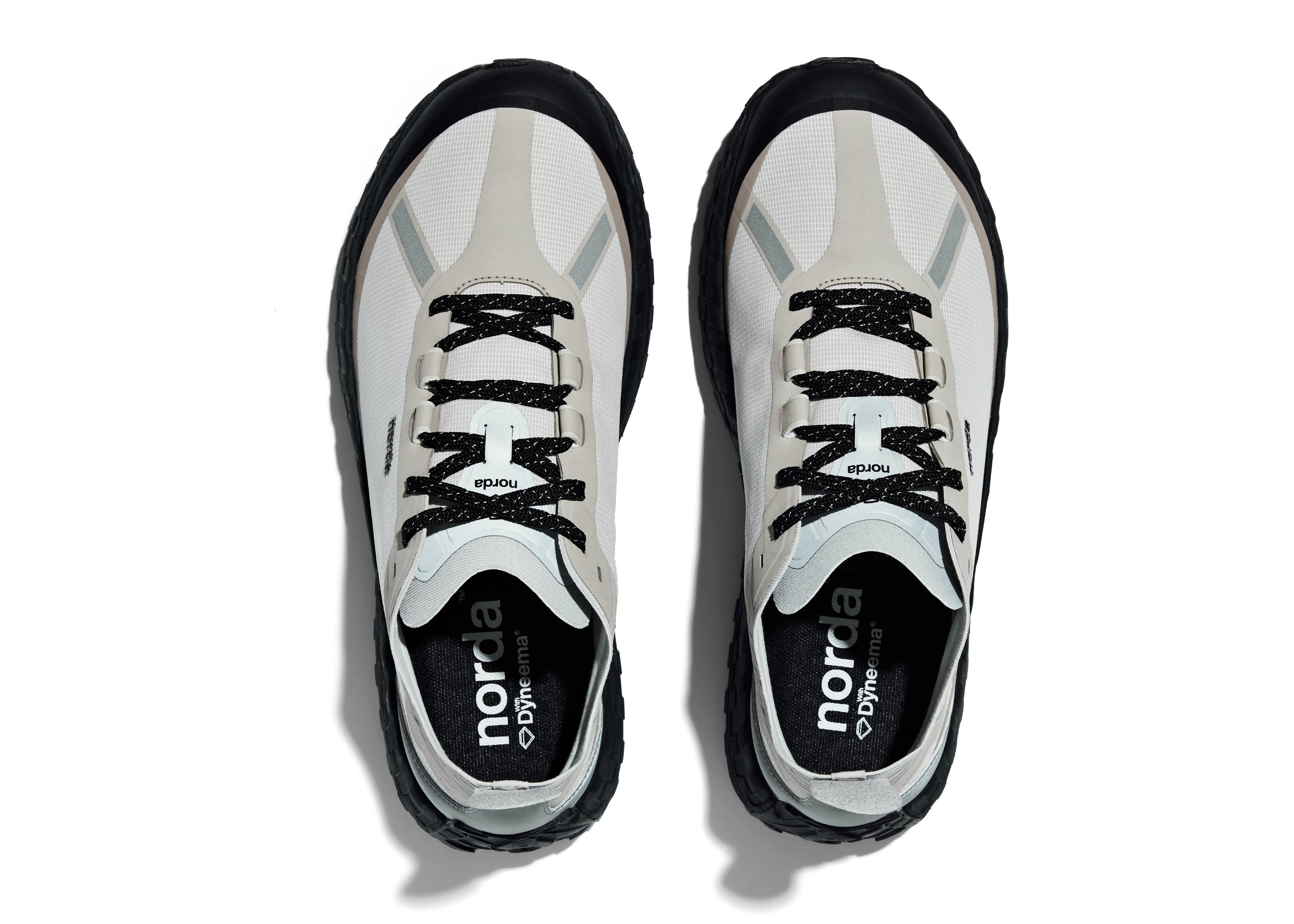001 Core - Women by Norda in white and black with Bio-Dyneema upper and Vibram soleplate for lightweight trail running in Canada
