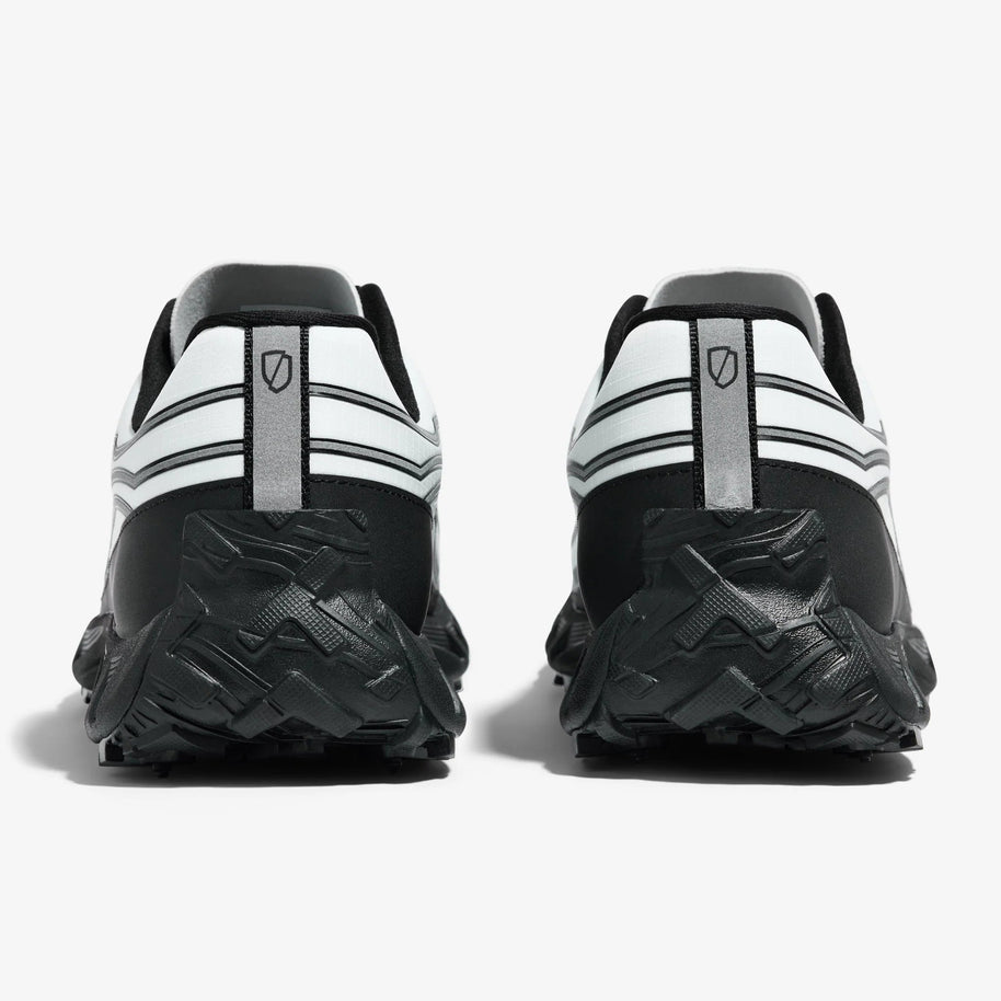 002 Core - Women by Norda in black and white with bio-based Dyneema®, low stack height, responsive trail running shoe for technical terrain and outdoor use