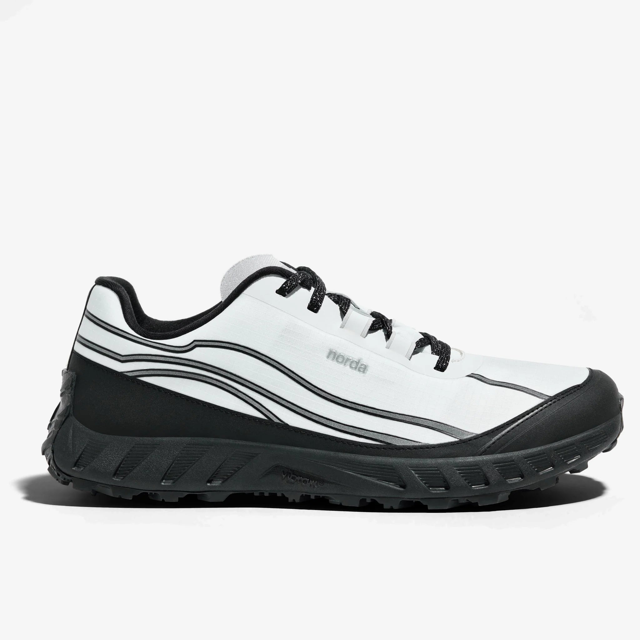 002 Core - Women by Norda in white and black trail running shoe with bio-based Dyneema for technical terrain and increased ground feel