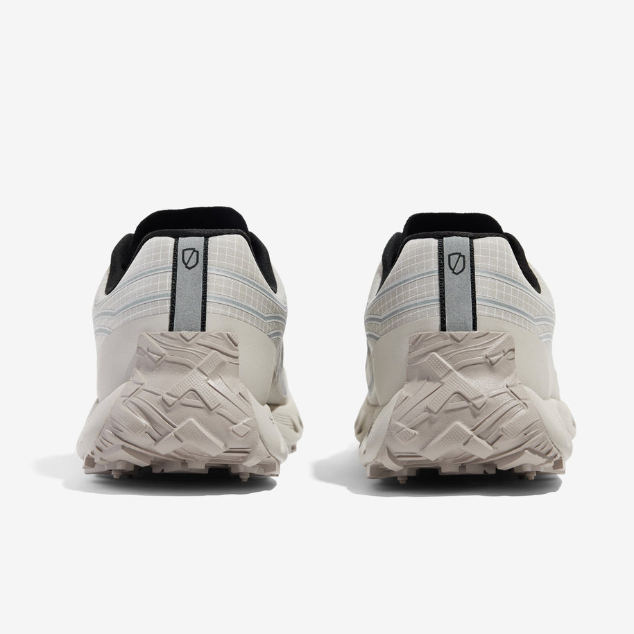 002 Core - Men by Norda in light beige and black, responsive trail running shoes with bio-based Dyneema® for technical terrain running