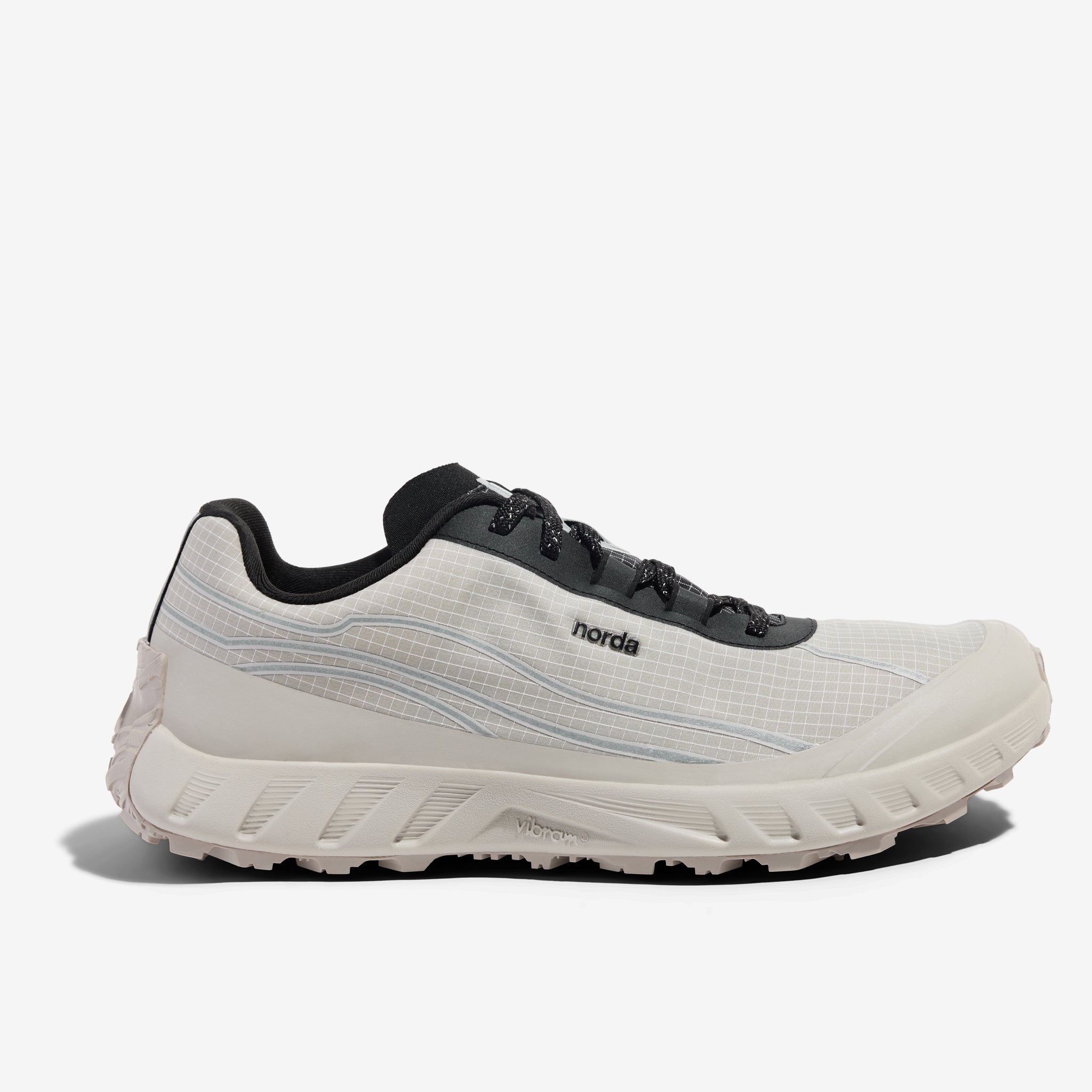 002 Core - Men by Norda in light beige and black, responsive trail running shoe with bio-based Dyneema for technical terrain in Canada