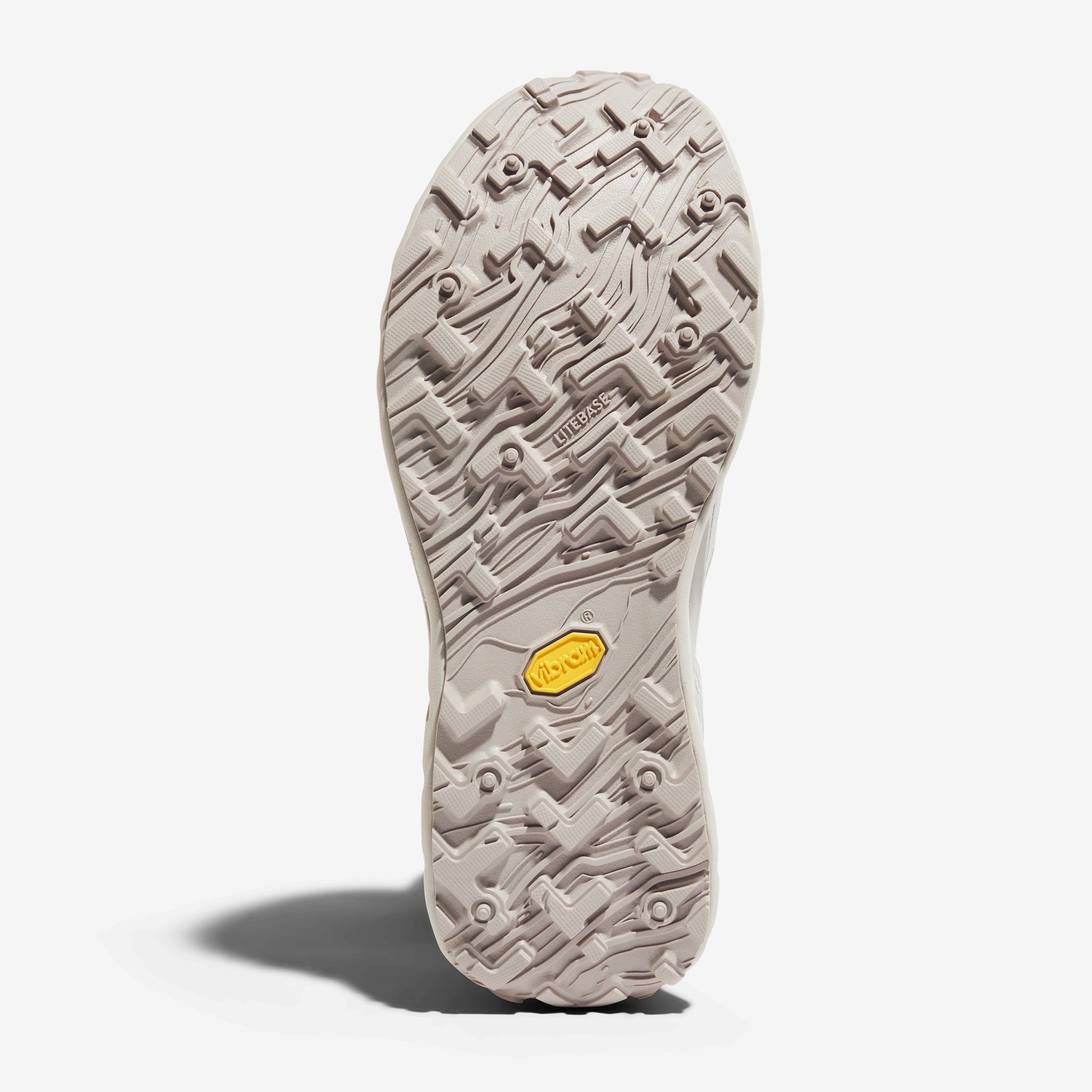 002 Core - Men by Norda in light beige with durable Vibram sole designed for responsive trail running on technical terrain