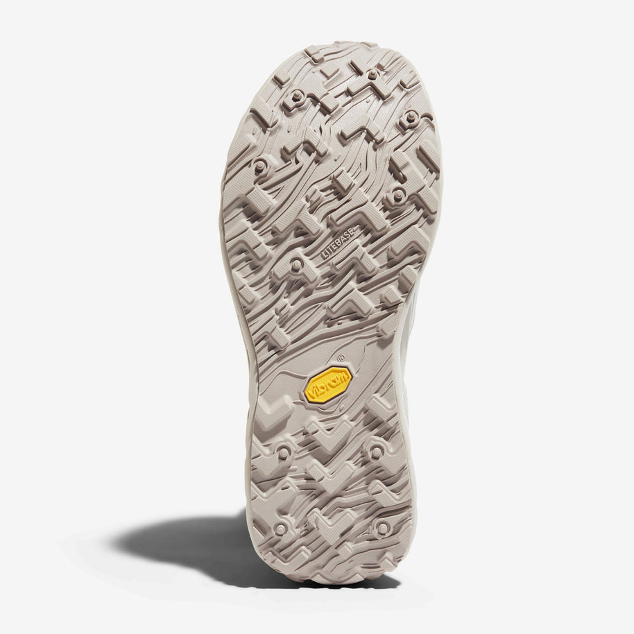 002 Core - Women by Norda in light beige with durable Vibram sole for responsive trail running on technical terrain and outdoor use