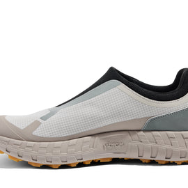 003 - Women by Norda in white, beige, and grey laceless approach shoe with Vibram sole, durable for hiking, scrambling, and running