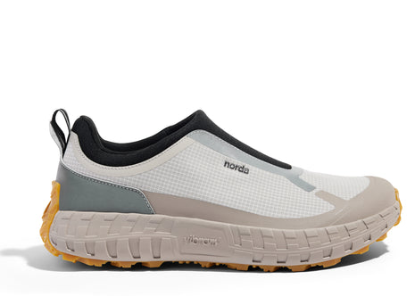 003 - Women by Norda in beige, black, and grey laceless approach shoe with Vibram sole designed for hiking, scrambling, and trail running in Canada
