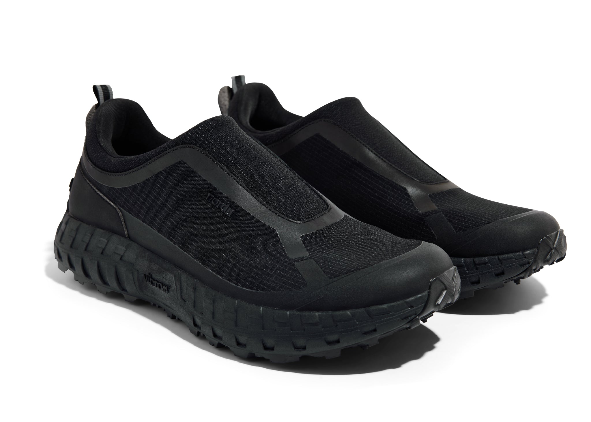 003 - Women by Norda in black durable laceless approach shoe with Vibram sole, supportive for hiking, scrambling, and trail running