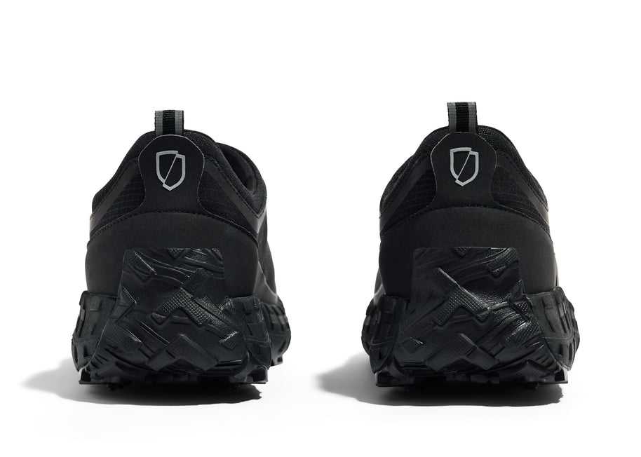003 - Women by Norda in black laceless approach shoe with Vibram soleplate designed for hiking, scrambling, and trail running
